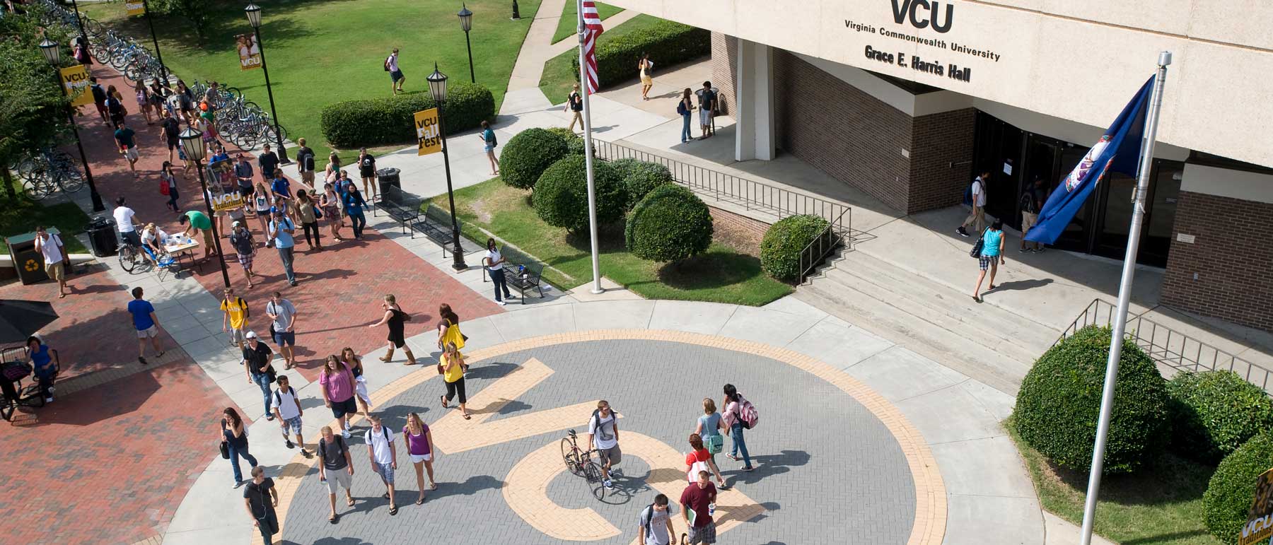 aerial view of students walking by harris hall on the campus of v.c.u.